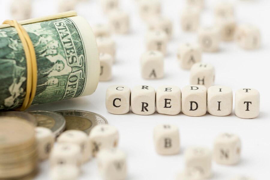 credit-written-scrabble-letters-bank-notes_23-2148525366